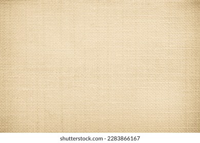 Detailed woven fabric texture background mesh pattern light beige color blank. Jute hessian sackcloth burlap canvas Natural weaving fiber linen and cotton cloth texture as clean empty for decoration.