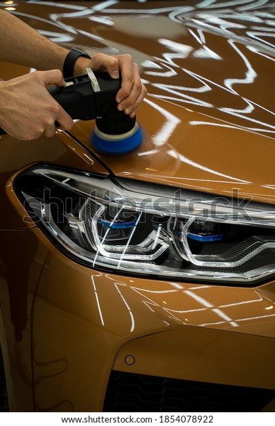 detailing car\
polishing and polishing the\
headlight