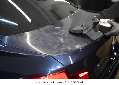 Detailing Master Applies Polishing Wax To The Car Body. Auto Detailing Concept