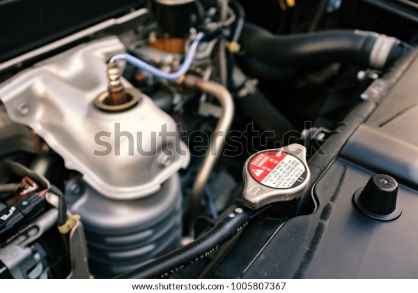 details of car engine, car radiator cap, old film\
look effect