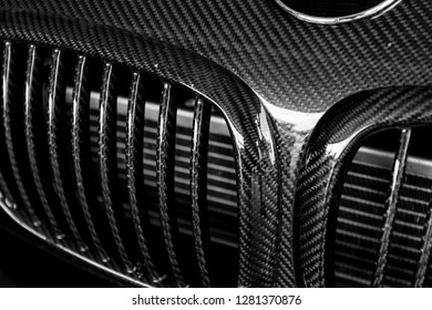 Details Of The Carbon Fiber Grille Of Sports Car In Black And White.