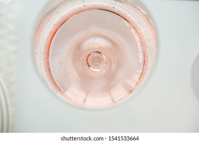 Details Of Champagne In A Glass From Above For Background.