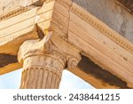 Details figures sculptures columns of the Acropolis of Athens with amazing and beautiful ruins Parthenon and blue cloudy sky in Greece