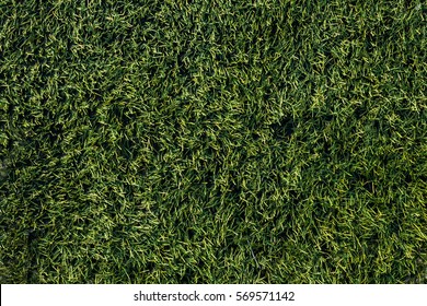 Details Of A Football Grass, Closeup View On Texture.