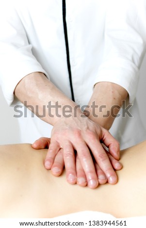 Similar – Female receiving treatment by professional osteopathy therapist