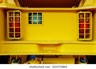 Details Of A Large Quarry Bulldozer. Exhibition Of Cars, Tractors, Dump Trucks And Other Equipment For The Mining Industry. Spare Parts Of Construction Machinery.