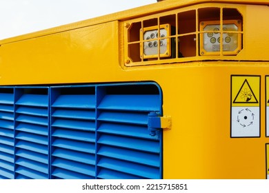 Details Of A Large Quarry Bulldozer. Exhibition Of Cars, Tractors, Dump Trucks And Other Equipment For The Mining Industry. Spare Parts Of Construction Machinery.