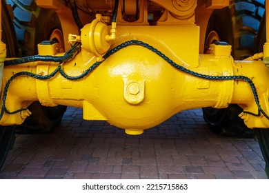 Details Of A Large Quarry Bulldozer. Exhibition Of Cars, Tractors, Dump Trucks And Other Equipment For The Mining Industry. Spare Parts Of Construction Machinery.