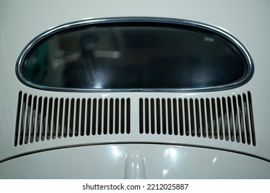 Details of old cars, the grille and rear window.