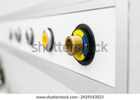 Details with the oxygen and air console outlets vacuum console outlet in a hospital patient room or operating room - medical gas system 