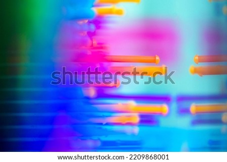 Details of rainbow express sculptor for stimulation of imagination and creative thinking. Blurred multi-colored abstract background macro