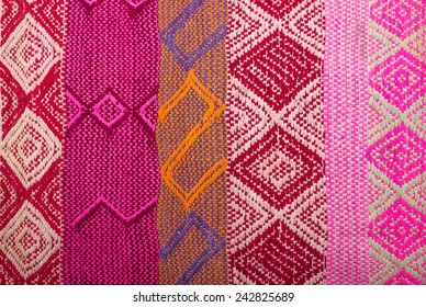 Details shot of indian fabric with colorful pattern.