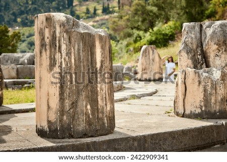 Details of stones and doric columns of  the ancient temple complex of Athena Pronaia in Delphi. Archaeological site, UNESCO World Heritage Site, Delphi, Greece.