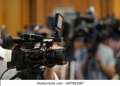 Details With Television Video Cameras And Recording Equipment During A Press Event