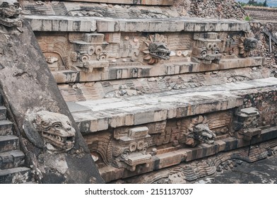 Details at the Temple of Quetzalcoatl (the Feathered Serpent) at Teotihuacan ancient city and vast archeological site in Central Mexico. The pyramid walls are decorated with stone carvings.