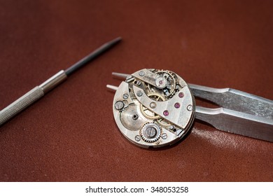 Details of watches and mechanisms for reparation, restoration and maintenance - Shutterstock ID 348053258