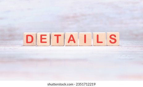 details word made of wooden cubes on a light background - Shutterstock ID 2351712219