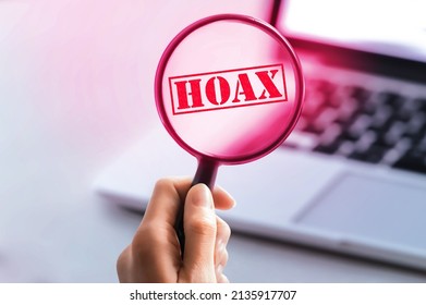 Detection of Haox on internet searching. laptop, computer on background. Internet search concept. Closeup of young woman looking on computer screen fake news.