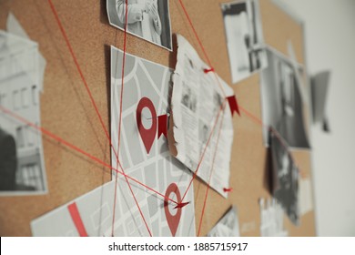 Detective Board With Crime Scene Photos And Red Threads, Closeup