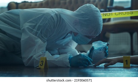 Detective Collecting Evidence In A Crime Scene. Forensic Specialists Making Expertise At Home Of A Dead Person. Homicide Investigation By Professional Police Officer.