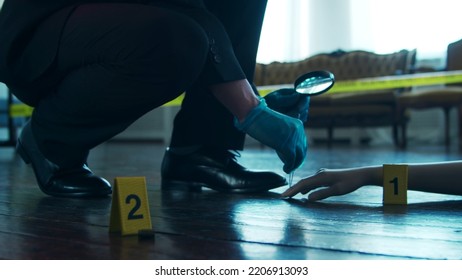 Detective Collecting Evidence In A Crime Scene. Forensic Specialists Making Expertise At Home Of A Dead Person. Homicide Investigation By Professional Police Officer.