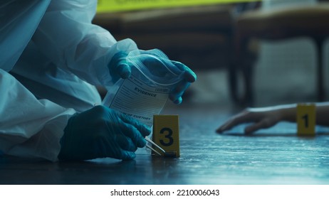 Detective Collecting Evidence In A Crime Scene. Forensic Specialists Making Expertise At Home Of A Dead Person. Homicide Investigation By Professional Police Officer.