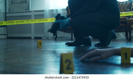 Detective Collecting Evidence In A Crime Scene. Forensic Specialists Making Expertise At Home Of A Dead Person. Homicide Investigation By Professional Police Officer.