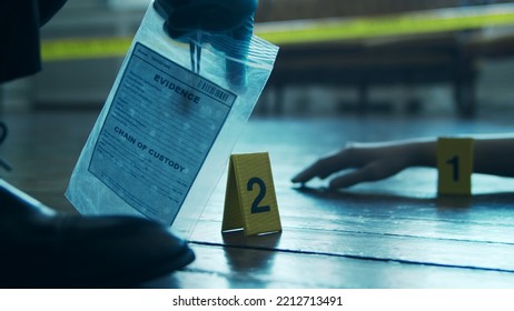 Detective Collecting Evidence In A Crime Scene. Forensic Specialists Making Expertise At Home Of A Dead Person. Homicide Investigation By Professional Police Officer.