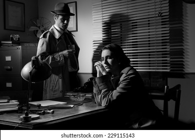 Detective Interviewing A Young Sad Woman In His Office, Film Noir Scene.