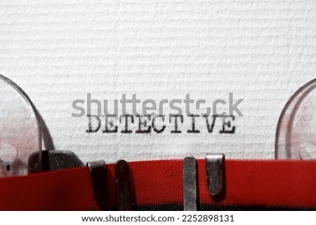 Detective word written with a typewriter.