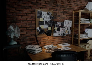 Detective workplace near brick wall in office