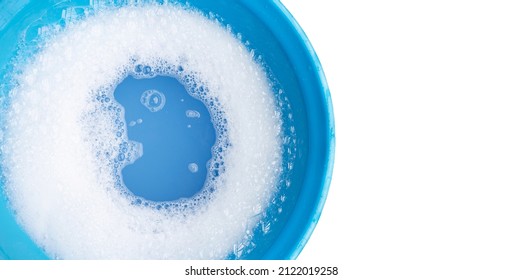 Detergent Foam Bubble In Blue Basin