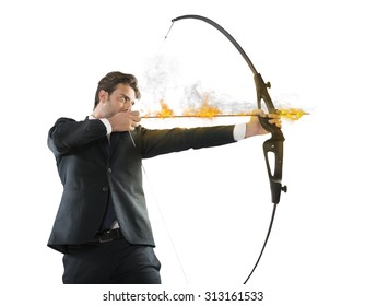 Determinated Businessman With Flaming Arrow Takes Aim