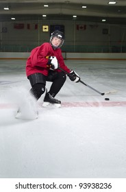 Determined Hockey Player Sprays Ice As He Makes Sharp Stop On Skates