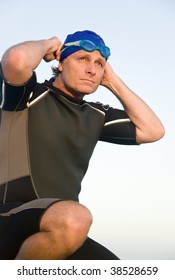 A Determined Looking Male Triathlete Or Swimmer.