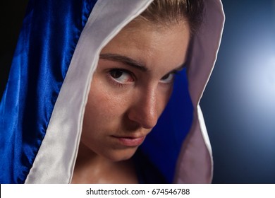 Determined Woman Wearing Boxing Robe In Fitness Studio