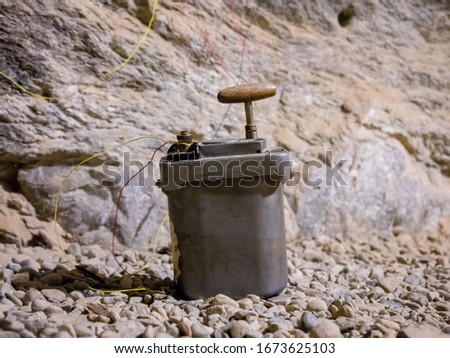 Detonator ready to explode dynamite in a mine