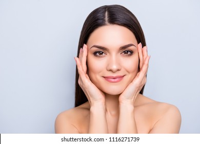 Detox botox collagen vitamins minerals treatment therapy concept. Gorgeous aesthetic woman with natural makeup enjoying her flawless perfect skin after laser procedure isolated on grey background