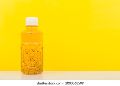 Detox Drink Or Juice With Chia Seeds On White Table Against Yellow Background With Copy Space. Concept Of Healthy Eating, Dieting, Weight Loss And Detox 