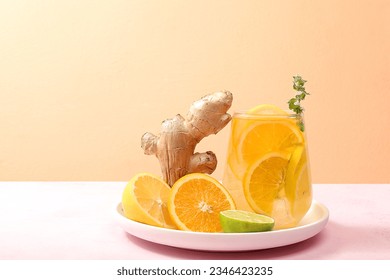 Detox drink with lemon, mint, lime, ginger and orange on a dark table, a cocktail improves metabolism and promotes weight loss, minimal healthy lifestyle concept, selective focus - Powered by Shutterstock