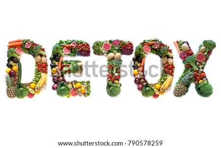 Detox spelt using large letters made of fruits and vegetables 