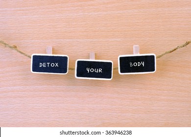 Detox Your Body Is Concept Wooden Board With Line On The Wooden Background.