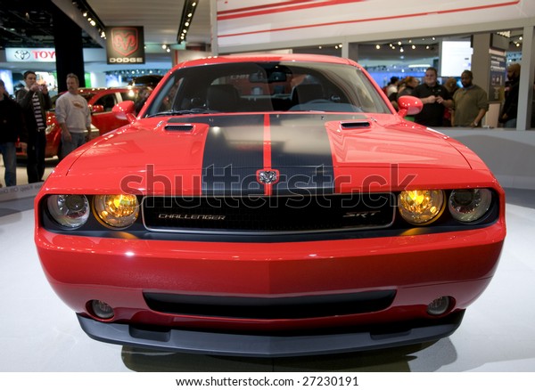 DETROIT - JAN 12 : Dodge Challenger on display\
at the North American International Auto Show on January 12, 2009\
in Detroit, Michigan. The annual event is among the largest auto\
shows in North America.