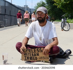 DETROIT, MI - JULY 6: Homeless veteran begs for money in Detroit, MI on July 6, 2014