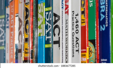Detroit, Michigan - December 12, 2020 : Row of ACT and SAT books contain standardized practice tests for university admissions in USA. 