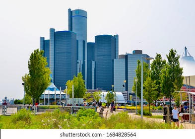 Detroit, Michigan, US- July 4, 2015: Detroit downtown riverside. People enjoying a sunny day on the America Independent holiday and celebration. Beautiful cityscape, with GM headquarters building.