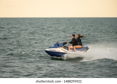 Detroit, Michigan / USA - 08-24-2019: Personal Watercrafts Having Fun On A Sunny Day At The Beach