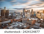 Detroit, Michigan, USA downtown skyline from above at dawn.