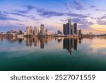 Detroit, Michigan, USA skyline at dawn on the Detroit River.