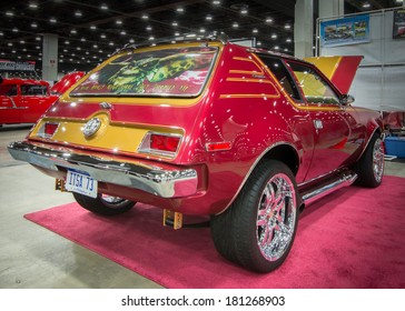 DETROIT, MI/USA - MARCH 9, 2014: A 1973 American Motors (AMC) Gremlin, Sponsored By Radio Station WOMC 104.3, On Display At The Detroit Autorama.